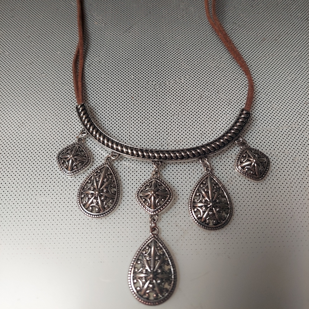 Silver and leather southwestern pendant necklace 16in to 19in